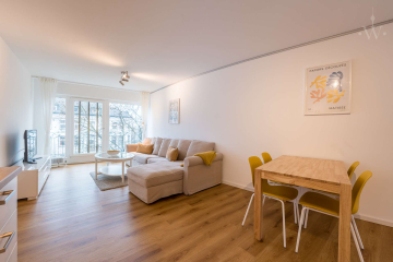 Wohnzimmer - Schöne 3-Zimmer-Wohnung in zentraler Lage mit Balkon