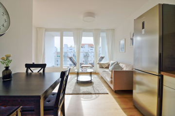 Wohnzimmer - Modernes 2-Zimmer-Apartment über den Dächern Berlins