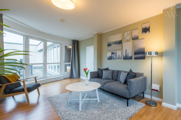 Wohnzimmer - Unser 2-Zimmer-Apartment mit großer Dachterrasse