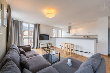 Wohnzimmer - Modern möblierte 2-Zimmer-Wohnung mit Blick über Berlin Schöneberg