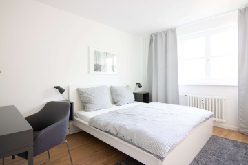 Schlafzimmer - Unsere gemütliche möblierte 2-Zimmer-Wohnung mit sonnigem Balkon