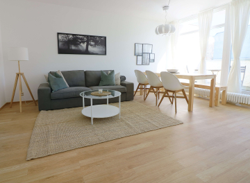 Wohnzimmer - Großzügige 5-Zimmer Maisonettewohnung in ruhiger Seitenstraßenlage